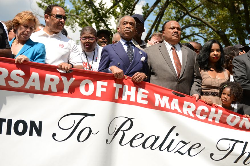 Civil rights leaders including Rev. Al Sharpton, center, and Martin Luther King, III, second from right, participate in a march to commemorate the 50th anniversary of the March on Washington and Martin Luther King Jr.'s famous "I Have a Dream" speech, Washington, D.C., Saturday, August 24, 2013. (Andrew Harnik/The Washington Times)