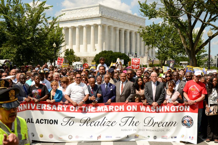 Civil rights leaders including Rev. Al Sharpton, center, and Martin Luther King, III, Jesse Jackson, and Rep. John Lewis (D-Ga.) participate in a march to commemorate the 50th anniversary of the March on Washington and Martin Luther King Jr.'s famous "I Have a Dream" speech, Washington, D.C., Saturday, August 24, 2013. (Andrew Harnik/The Washington Times)