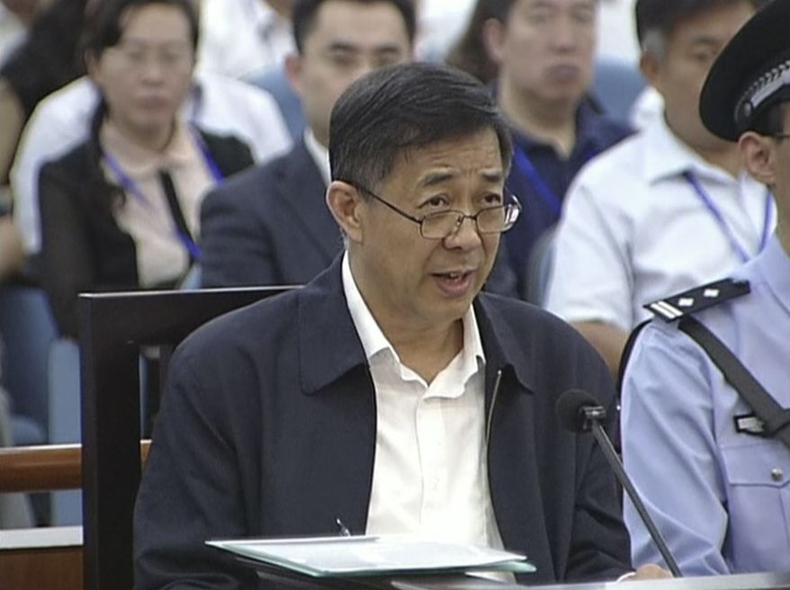 Chinese politician Bo Xilai speaks during his trial in Jinan Intermediate People's Court in Jinan, in eastern China's Shandong province, on Sunday, Aug. 25, 2013. Mr. Bo sought to discredit his former top aide as a lying, unreliable witness as the ousted leader denied criminal responsibility in the country's messiest political scandal in decades. (AP Photo/CCTV via AP Video)