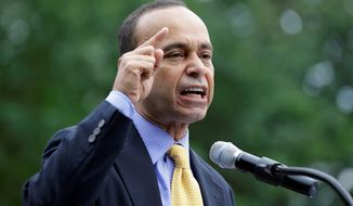 Border Buster: Rep. Luis V. Gutierrez, Illinois Democrat, took his immigration reform message to the districts of two Virginia Republicans: Rep. Frank R. Wolf and Rep. Bob Goodlatte. (Associated Press)