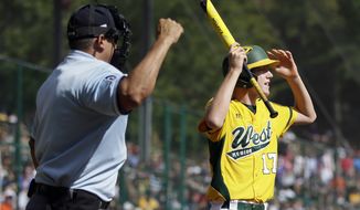 Chula Vista, Calif.&#39;s Grant Holman reacts after striking out to Tokyo, Japan&#39;s Kazuki Ishida during the second inning of the Little League World Series Championship baseball game, Sunday, Aug. 25, 2013, in South Williamsport, Pa. Tokyo, Japan won 6-4. (AP Photo/Matt Slocum)