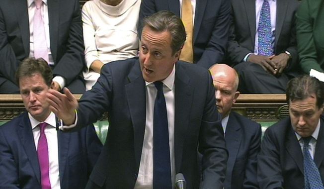 In this image taken from video, Britain&#x27;s Prime Minister David Cameron, center, speaks during a debate on Syria, in Britain&#x27;s parliament, London, Thursday, Aug. 29, 2013. (AP Photo / PA)