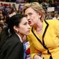 Hillary Rodham Clinton (right) shares a word with Huma Abedin, her personal assistant and trusted confidant. **FILE**