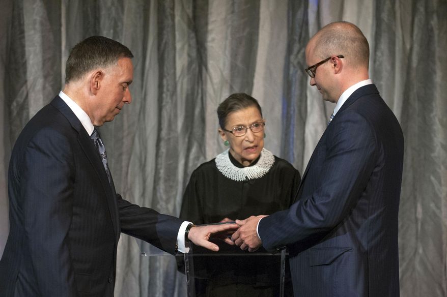 This photo provided by The Kennedy Center shows Michael M. Kaiser, left, and John Roberts, right, being married by Justice Ruth Bader Ginsburg, center, at the Kennedy Center on Saturday, Aug. 31, 2013. (AP Photo/The Kennedy Center, Margot Schulman)