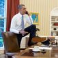 President Barack Obama talks on the phone in the Oval Office with Speaker of the House Boehner, Saturday, August 31, 2013. Vice President Joe Biden listens at right. (credit: White House photo/Pete Souza)