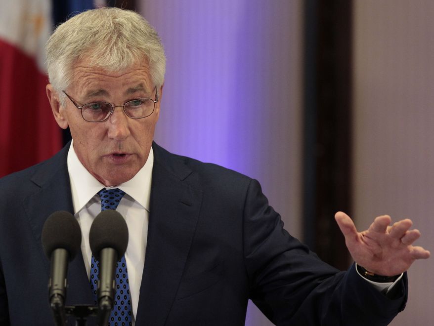 Defense Secretary Chuck Hagel answers questions from reporters during his visit at the Malacanang Palace in Manila on Friday, Aug. 30, 2013. (AP Photo/Aaron Favila)