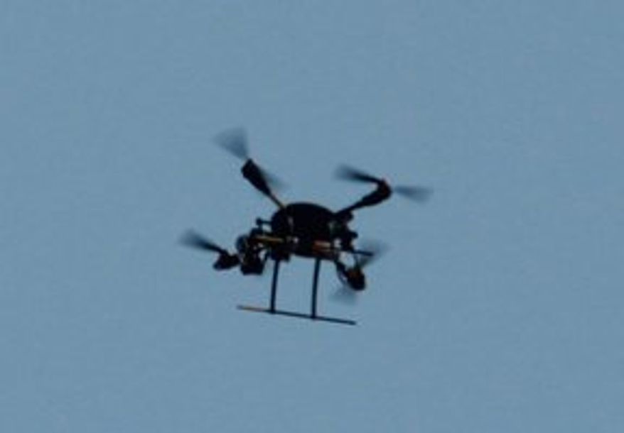 Alexandria resident Robert Rapanut photographed a drone he saw hovering over a six-alarm fire at a warehouse Monday afternoon. (Photo courtesy of Robert Rapanut)
