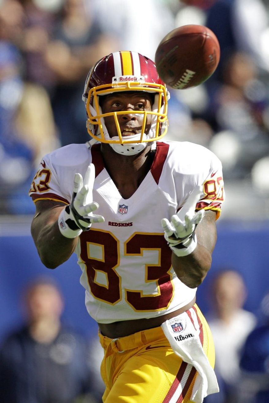 Coming off a season-ending injury, big things are expected of tight end Fred Davis in 2013. Sports Editor Mike Harris and Thom Loverro of ESPN 980 predict that Davis will lead the Redskins in receptions. (associated press)