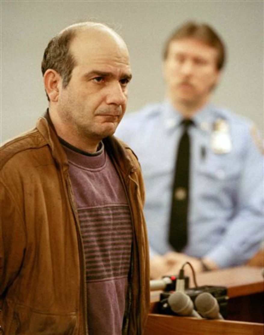 ** FILE ** John Esposito faces the court during his arraignment in Central Islip, N.Y., on charges he imprisoned 10-year-old Katie Beers in an underground bunker for 17 days, Jan. 21, 1993. Esposito, convicted for kidnapping Beers and hiding her under his Bay Shore, N.Y. home in 1992, died Wednesday, Sept. 4, 2013 at his jail cell in Sing Sing Correctional Facility in Ossining, N.Y. He was serving a 15 years-to-life prison term. (Associated Press)