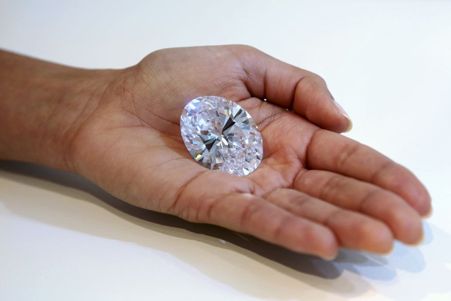 A 118-carat white diamond will be auctioned off by Sotheby's on Oct. 7 in Hong Kong. The gem has a presale estimate of $28 million to $35 million. The current record for a white diamond is $26.7 million. (AP Photo/Mary Altaffer)