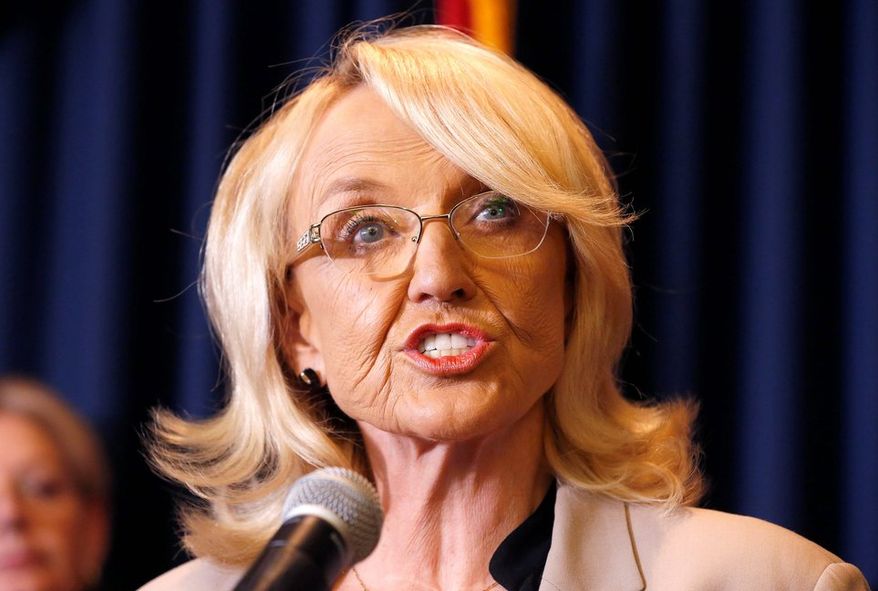 Arizona Gov. Jan Brewer, in pressing for more federal assistance, said at least 17 homeowners proved that they are underinsured, and that "this number certainly will increase" as homeowners realize their insurance policies do not cover their losses from fire. (ASSOCIATED PRESS PHOTOGRAPHS)