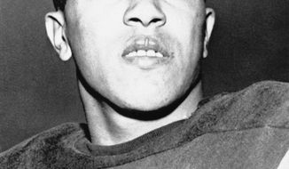 **FILE** Darryl Hill of Kenilworth, Md., is pictured in 1961, when he starred on the Navy plebe team, scoring seven touchdowns, before transferring to Maryland. (AP Photo)