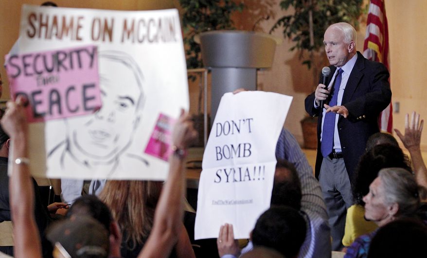 American sentiment, whether it be from polls or public demonstrations, is clearly leaning against intervention. Sen. John McCain learned that firsthand during a recent town hall session in Arizona. A war-weary country seems unwilling to engage in another Mideast commitment, even if it's limited. (credit: AP)