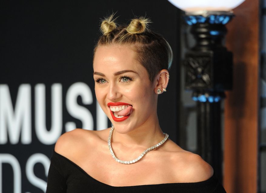 Singer Miley Cyrus attends the MTV Video Music Awards in the Brooklyn borough of New York on Sunday, Aug. 25, 2013. (Evan Agostini/Invision/AP)