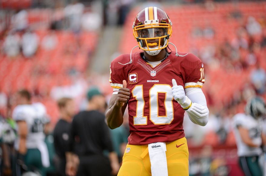 Washington Redskins quarterback Robert Griffin III (10) warms up before the Washington Redskins play the Philadelphia Eagles in Monday Night NFL football at FedExField, Landover, Md., Monday, September 9, 2013. (Andrew Harnik/The Washington Times)