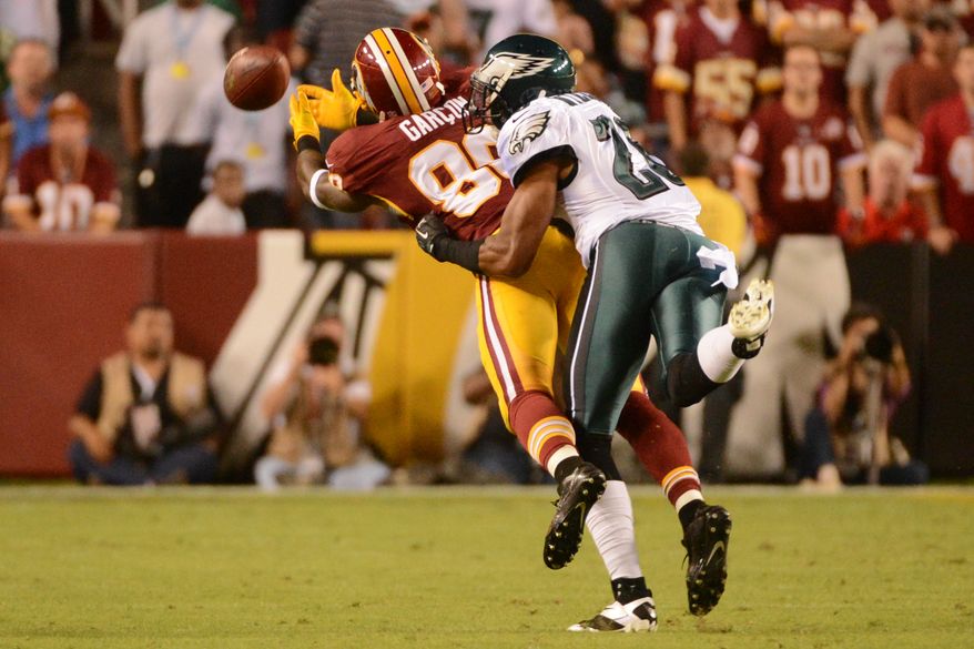 A ball intended for Washington Redskins wide receiver Pierre Garcon (88) is overthrown in the second quarter as the Washington Redskins play the Philadelphia Eagles in Monday Night NFL football at FedExField, Landover, Md., Monday, September 9, 2013. (Andrew Harnik/The Washington Times)