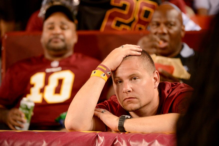 Fans sit dejected in the stands in the third quarter as the Washington Redskins play the Philadelphia Eagles in Monday Night NFL football at FedExField, Landover, Md., Monday, September 9, 2013. (Andrew Harnik/The Washington Times)