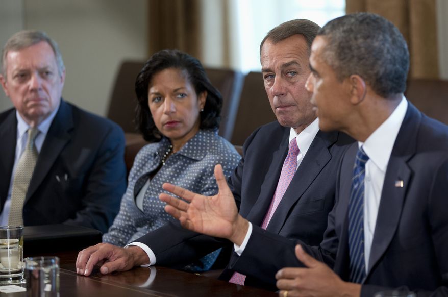 ** FILE ** President Barack Obama speaks to media in the Cabinet Room of the White House in Washington, Tuesday, Sept. 3, 2013, before a meeting with congressional leaders to discuss the situation in Syria. From left are, Senate Majority Whip Richard Durbin of Ill., National Security Adviser Susan Rice, House Speaker John Boehner of Ohio and the president. (AP Photo/Carolyn Kaster)