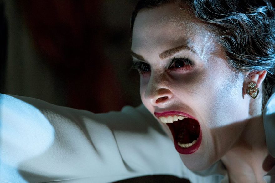 There's a lot of screeching, thumping and assorted other loud noises in "Insidious: Chapter 2." Danielle Bisutti is among the cast. (FilmDistrict via Associated Press)