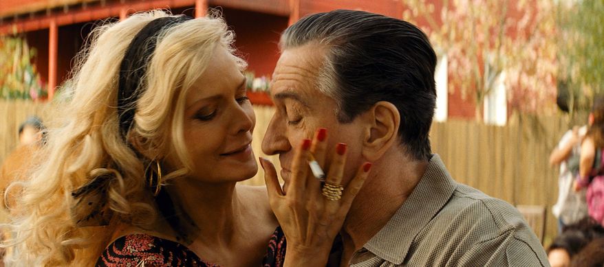 Michelle Pfeiffer, left, and Robert DeNiro in "The Family." (AP Photo/Relativity Media)