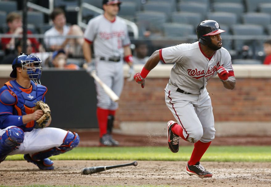 Denard Span watches his eighth-inning double on Thursday that extended his career-long hitting streak to 23 games. (Associated Press photo)