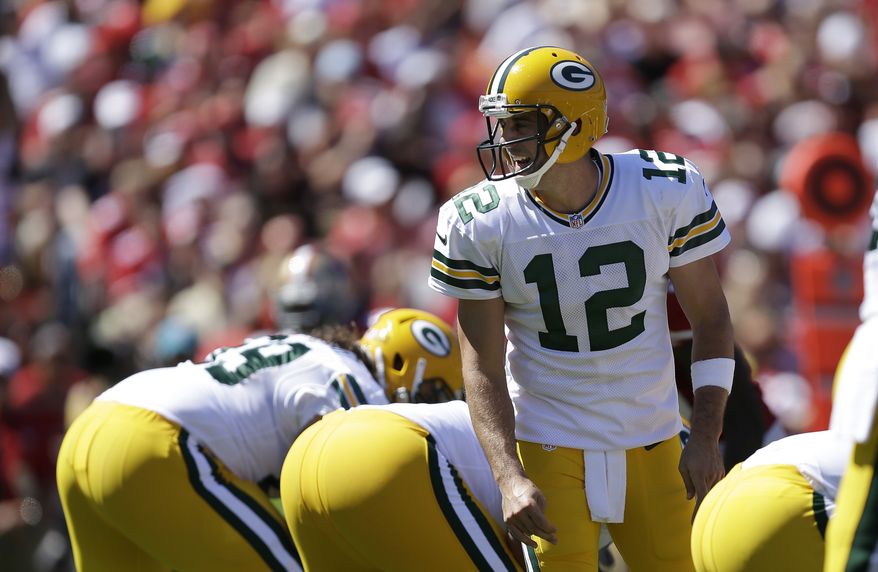 Green Bay Packers quarterback Aaron Rodgers (12) is seen reacting against the San Francisco 49ers during the first half of an NFL football game in San Francisco, Sunday, Sept. 8, 2013. (AP Photo/Ben Margot)