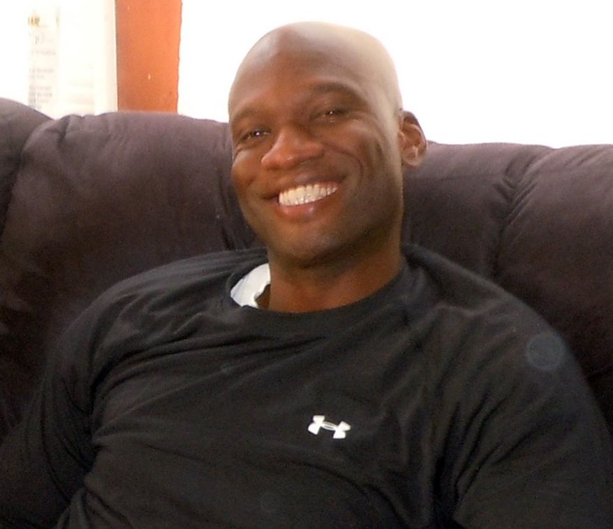 This undated photo provided by Kristi Suthamtewakul shows Aaron Alexis. Officials say Alexis, an information technology employee with a defense contractor, used a valid pass to get into the Washington Navy Yard building where he opened fire Monday, Sept. 16, 2013, killing 12 people. (AP Photo/Courtesy of Kristi Suthamtewakul)