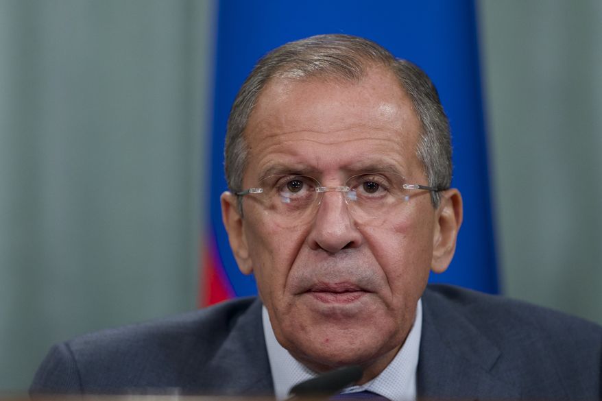 Russian Foreign Minister Sergey Lavrov speaks during a news conference after his meeting with French counterpart Laurent Fabius, unseen, in Moscow, Russia, on Tuesday, Sept. 17, 2013. Moscow is insisting that a new United Nations resolution on Syria not allow the use of force, but Russia's foreign minister appears to suggest the issue could be reconsidered if Syria violates an agreement on abandoning its chemical weapons. (AP Photo/Ivan Sekretarev)