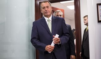 House Speaker John A. Boehner, Ohio Republican, and other House GOP leaders emerge from a closed-door strategy session at the Capitol in Washington on Wednesday, Sept. 18, 2013. House Majority Whip Kevin McCarthy, California Republican, follows Mr. Boehner. (AP Photo/J. Scott Applewhite)