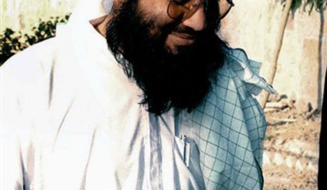 ** FILE **  The Taliban&#x27;s then-Foreign Minister Wakil Ahmed Muttawakil in Kandahar, Afghanistan is seen in this March 4, 2001 photo. Muttawakil, who served as foreign minister when the Taliban ruled Afghanistan, hailed Pakistan&#x27;s release of Mullah Abdul Ghani Baradar, the Taliban&#x27;s former deputy leader, on Saturday, Sept. 21, 2013. (AP Photo/Kamal Khan, File)