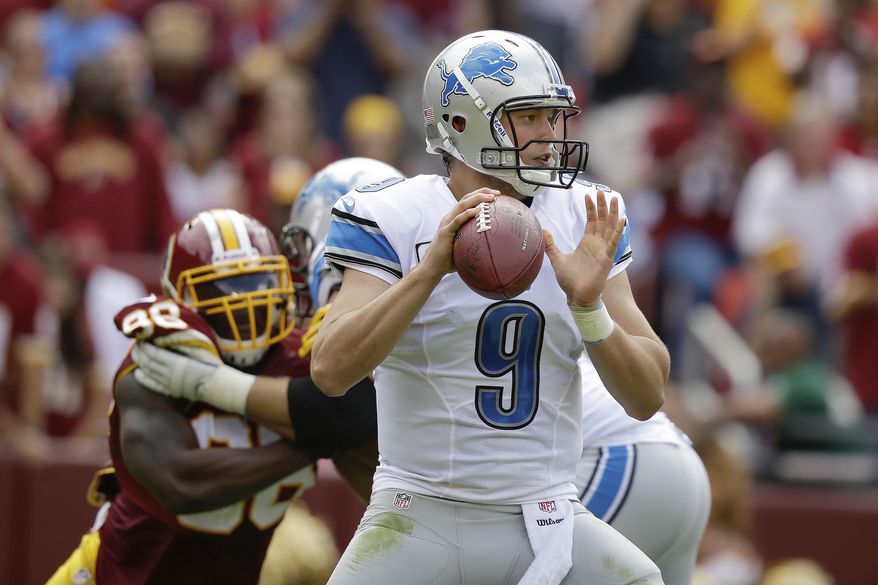 Detroit Lions quarterback Matthew Stafford passes the ball during the first half of a NFL football game against Washington Redskins in Landover, Md., Sunday, Sept. 22, 2013. (AP Photo/Alex Brandon)