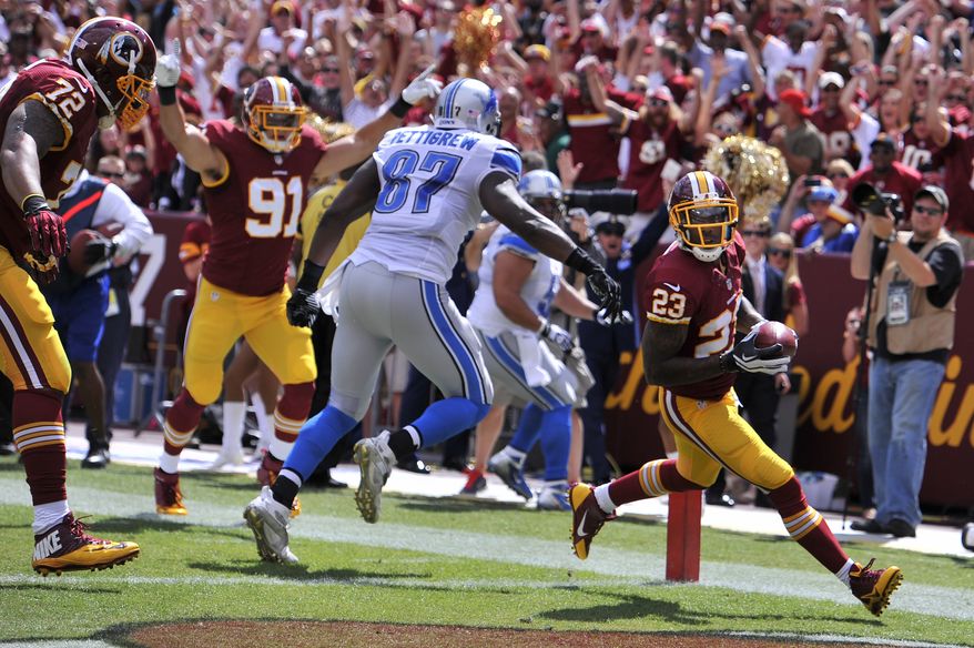 Washington Redskins cornerback DeAngelo Hall (23) intercepts a first quarter pass and runs in back 17 yards for the touchdown as the Washington Redskins play the Detroit Lions at FedExField, Landover, Md., September 22, 2013. (Preston Keres/Special for The Washington Times)