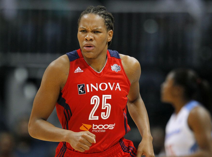 Washington Mystics forward Monique Currie reacts after scoring in Game 3 of a WNBA basketball Eastern Conference semifinal series against the Atlanta Dream, Monday, Sept. 23, 2013, in Atlanta. (AP Photo/Todd Kirkland)