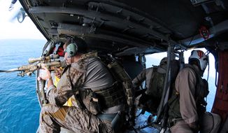 U.S. Navy SEALs in action. (U.S. Navy photo)