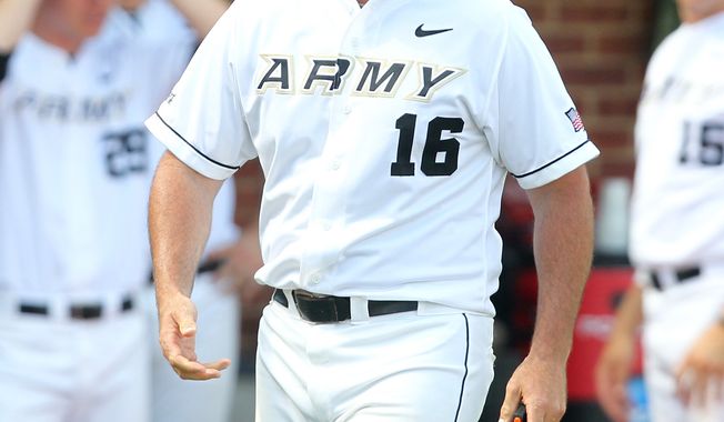 Army's head coach Joe Sottolano walks to the mound during the seventh inning against UNC Wilmington in an NCAA college baseball tournament regional game in Charlottesville, Va., Saturday, June 1, 2013. UNC Wilmington defeated Army 9-5. (AP Photo/Andrew Shurtleff)