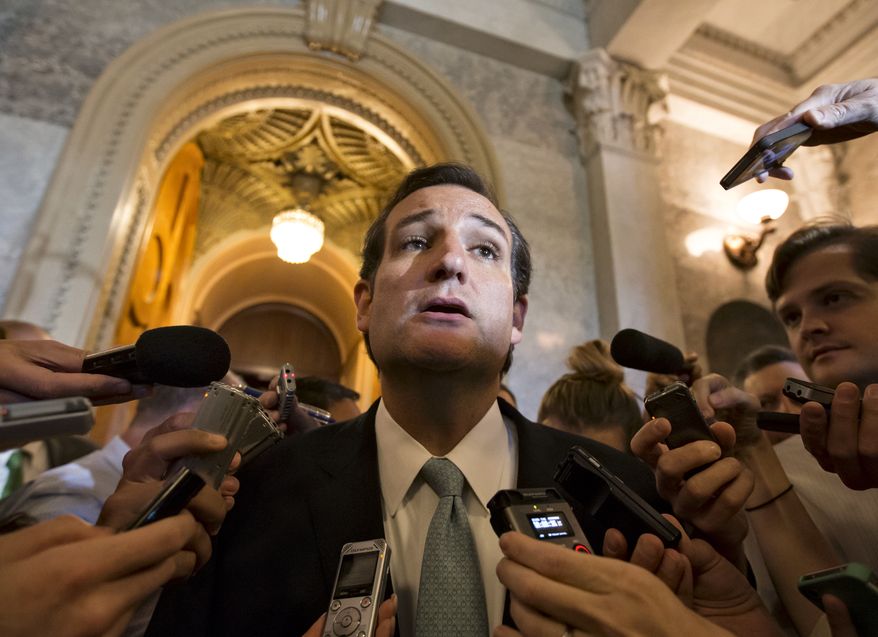 Sen. Ted Cruz, Texas Republican, talks to reporters as he emerges from the Senate Chamber on Capitol Hill in Washington on Sept 25, 2013, after his overnight crusade railing against the Affordable Care Act, popularly known as "Obamacare." Cruz ended the marathon Senate speech opposing President Obama's health care law after talking for 21 hours, 19 minutes. (Associated Press)