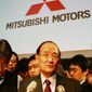 **FILE** Takashi Nishioka, Mitsubishi Motors&#39; new chairman and CEO, is surrounded by reporters after a news conference a Tokyo hotel on Jan. 28, 2005, to announce the Japanese automaker&#39;s business revitalization plan. (Associated Press)
