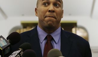 Newark Mayor and senate candidate Cory Booker listens to a question in Newark, N.J., Thursday, Sept. 26, 2013. Booker says the disclosure that he messaged with a stripper isn&#x27;t going to change anything about how he uses Twitter. The Democratic mayor of Newark, N.J., told reporters Thursday he communicates with thousands of people on Twitter and doesn&#x27;t pay attention to their handles or profession. (AP Photo/Mel Evans)