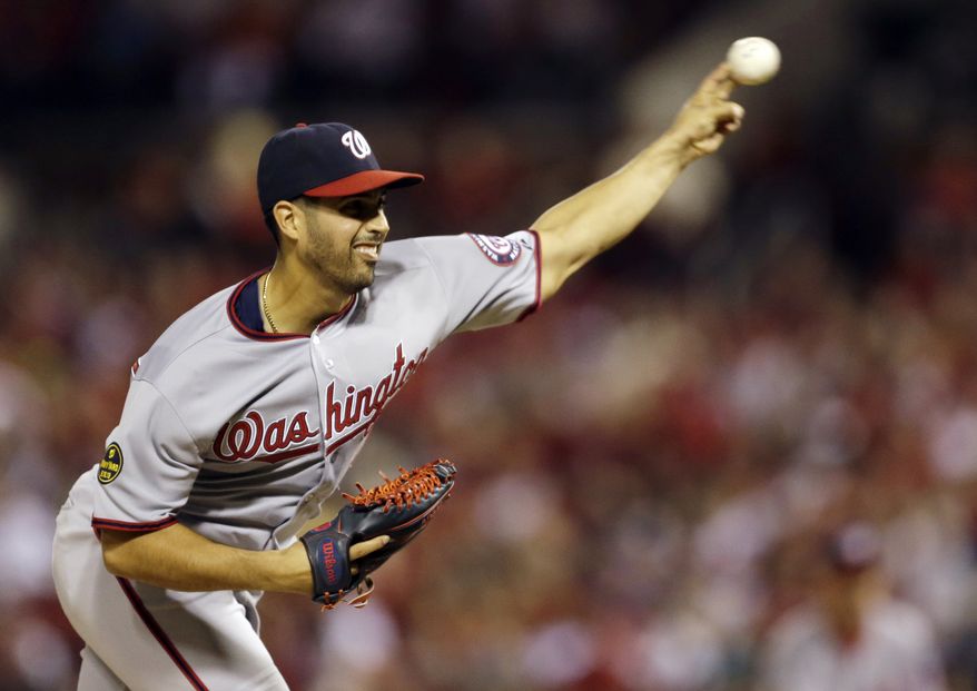 Washington Nationals starting pitcher Gio Gonzalez throws against the St. Louis Cardinals during the fourth inning of a baseball game on Tuesday, Sept. 24, 2013, in St. Louis. (AP Photo/Jeff Roberson)