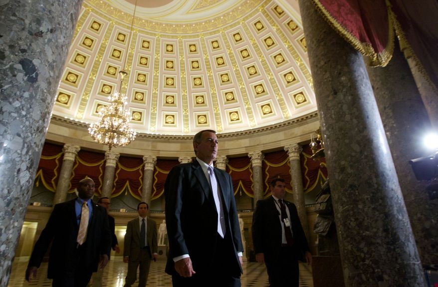House Speaker John Boehner of Ohio, walks to the House Floor at the U.S. Capitol in Washington, Saturday, Sept. 28, 2013. Lawmakers from both parties urged one another in a rare weekend session to give ground in their fight over preventing a federal shutdown, with the midnight Monday deadline fast approaching. But there was no sign of yielding Saturday in a down-to-the-wire struggle that tea party lawmakers are using to try derailing President Barack Obama's health care law. (AP Photo/Molly Riley)