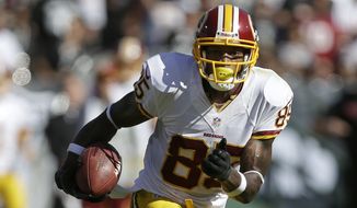 Washington Redskins wide receiver Leonard Hankerson (85) runs against the Oakland Raiders during the second half of an NFL football game in Oakland, Calif., Sunday, Sept. 29, 2013. (AP Photo/Marcio Jose Sanchez)
