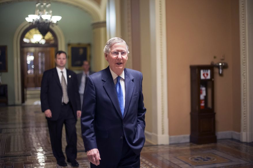 Senate Minority Leader Mitch McConnell, R-Ky., leaves the Senate Chamber after lawmakers once again rejected the House version of the government funding bill, Monday night, Sept. 30, 2013, in Washington. The Republican-controlled House and the Democrat-controlled Senate are at an impasse as Congress continues to struggle over how to prevent a possible shutdown of the federal government when it runs out of money. (AP Photo/J. Scott Applewhite)