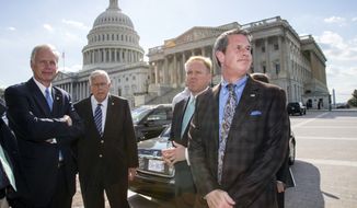 Sen. David Vitter, R-La., far right, assembles a group of conservative voices, including from left,  Sen. Ron Johnson, R-Wis., Sen. Mike Enzi, R-Wyo., Brian Baker, president of Ending Spending, to join him in criticizing the Affordable Care Act, at the Capitol in Washington, Monday, Sept. 30, 2013. Vitter told reporters that if Congress is going to write a law that forces Americans to use Obamacare through the individual mandate, then members of Congress should be prepared to do so as well. (AP Photo/J. Scott Applewhite)