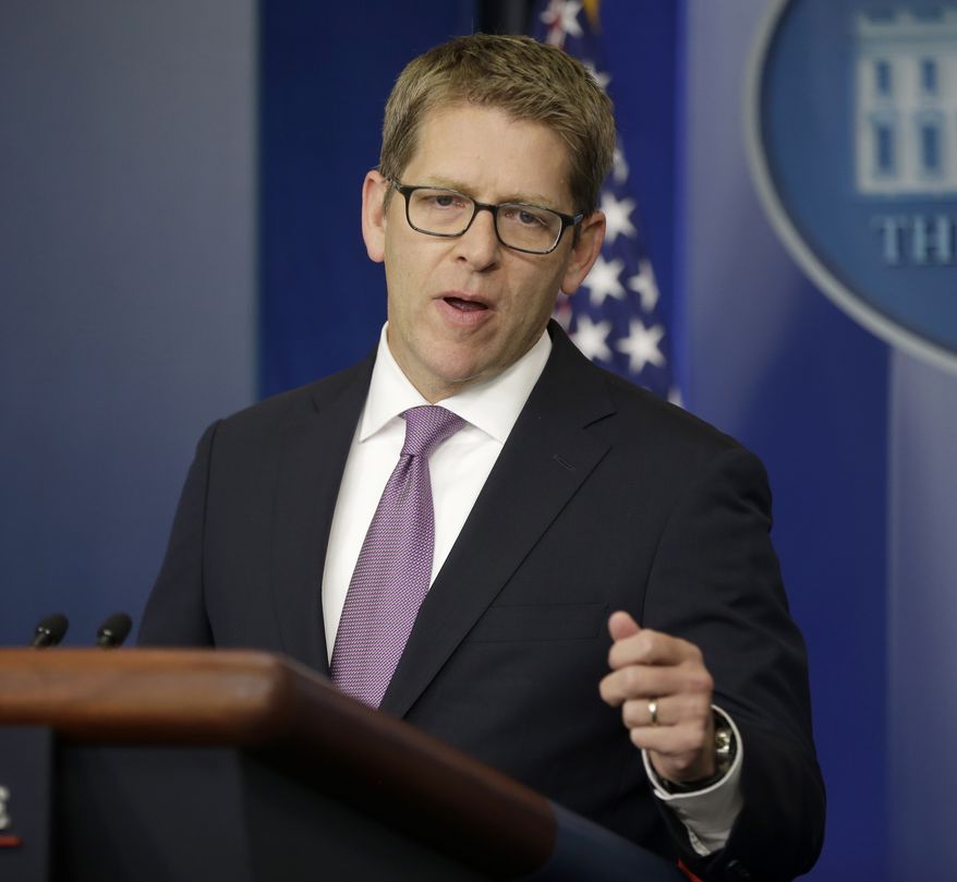 White House press secretary Jay Carney gestures while speaking during his daily news briefing at the White House in Washington on Monday, Sept. 30, 2013. (AP Photo/Pablo Martinez Monsivais)