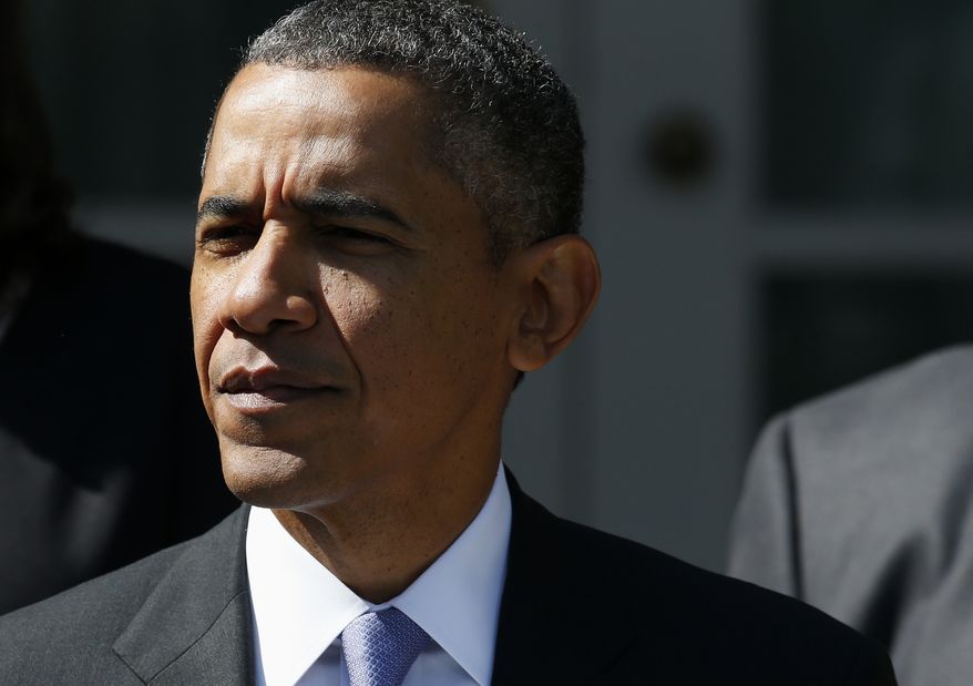 President Barack Obama in the Rose Garden at the White House in Washington, Tuesday, Oct. 1, 2013, to speak about the Affordable Care Act, his signature health care law. Congress plunged the nation into a partial government shutdown Tuesday as a long-running dispute over President Barack Obama's health care law forced about 800,000 federal workers off the job, suspending all but essential services. (AP Photo/Charles Dharapak)