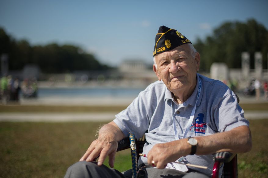 Navy veteran James Nerad Jr. visits the World War II Memorial for the first time Wednesday despite its official closure. (andrew s. geraci/the Washington Times)