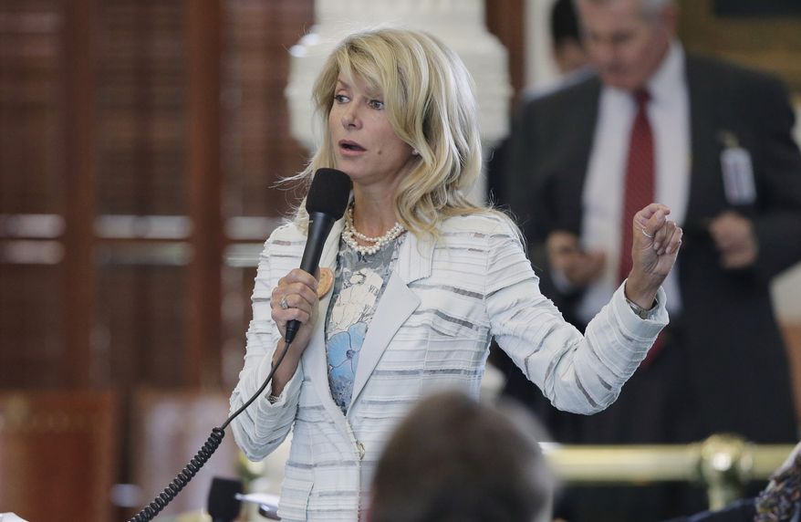 File - In this June 25, 2013 file photo, Sen. Wendy Davis, D-Fort Worth, speaks as she begins a filibuster in an effort to kill an abortion bill, in Austin, Texas. Davis is expected to announce her bid for Texas governor on Thursday, Oct. 3 2013. When she does, she’ll be speaking not only to Texans but also national Democratic fundraisers she’ll need to compete in the predominantly Republican state. (AP Photo/Eric Gay, File)