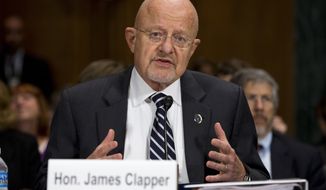 ** FILE ** National Intelligence Director James Clapper testifies on Capitol Hill in Washington, Wednesday, Oct. 2, 2013, before the Senate Judiciary Committee oversight hearing on the Foreign Intelligence Surveillance Act. U.S. intelligence officials say the government shutdown is seriously damaging the intelligence community&#39;s ability to guard against threats. (AP Photo/Evan Vucci)