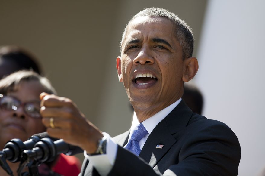 ** FILE ** President Obama gestures during a statement on the government shutdown in the Rose Garden of the White House in Washington, Oct. 1, 2013. (AP Photo/ Evan Vucci)