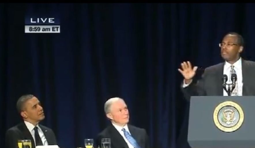 Ben Carson, right, speaking at the 2013 National Prayer Breakfast in Washington, where he burst on the national scene when he criticized Obamacare with President Obama himself seated nearby on the dais. (Courtesy of C-SPAN)